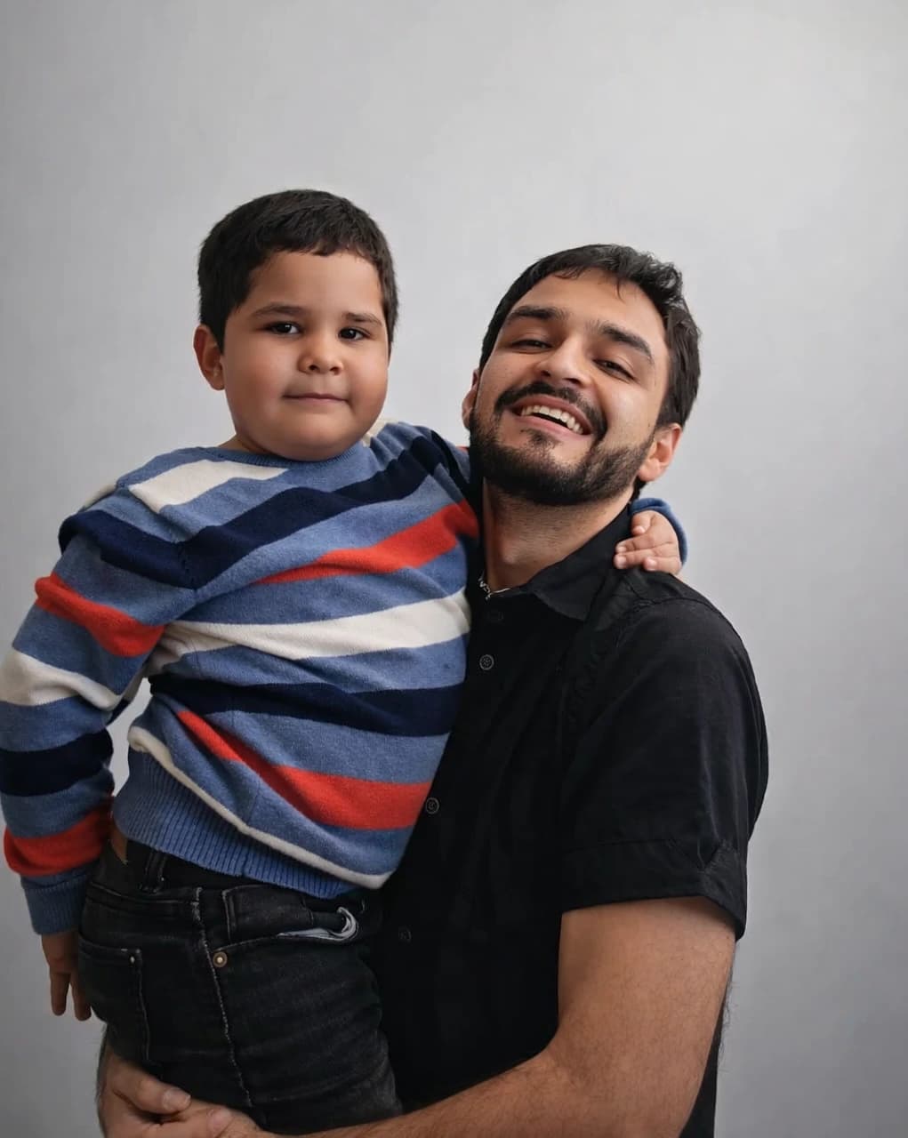 Hands holding coffee cups in a toast